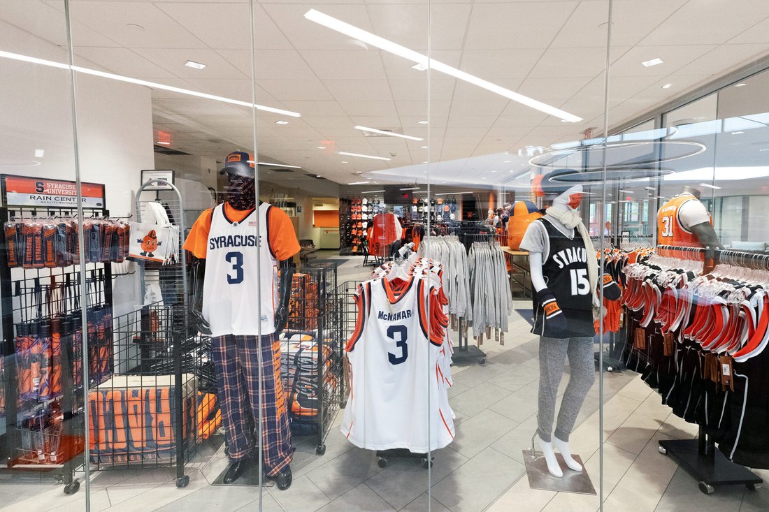 Look inside the Schine campus store with basketball jerseys and other apparel in sight.